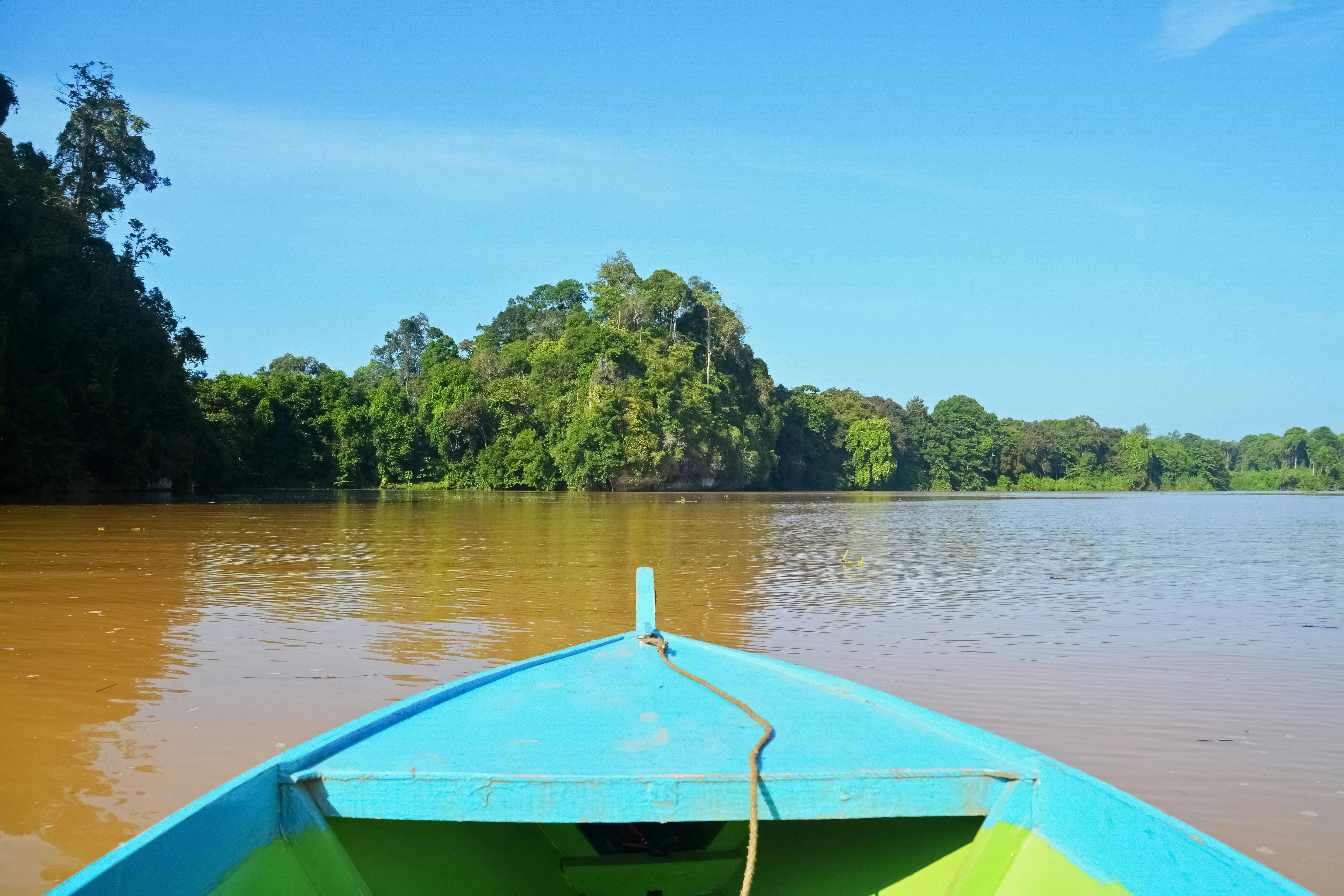 green kayak on lake during daytime